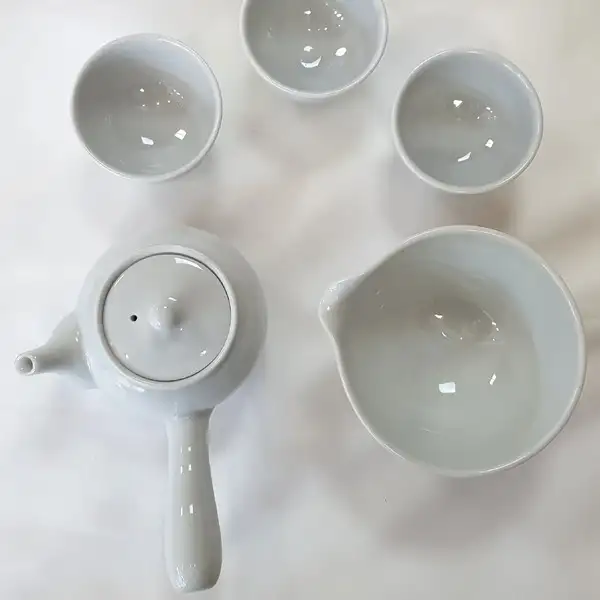 Delicate Wheel-Thrown Porcelain Tea Set for Three