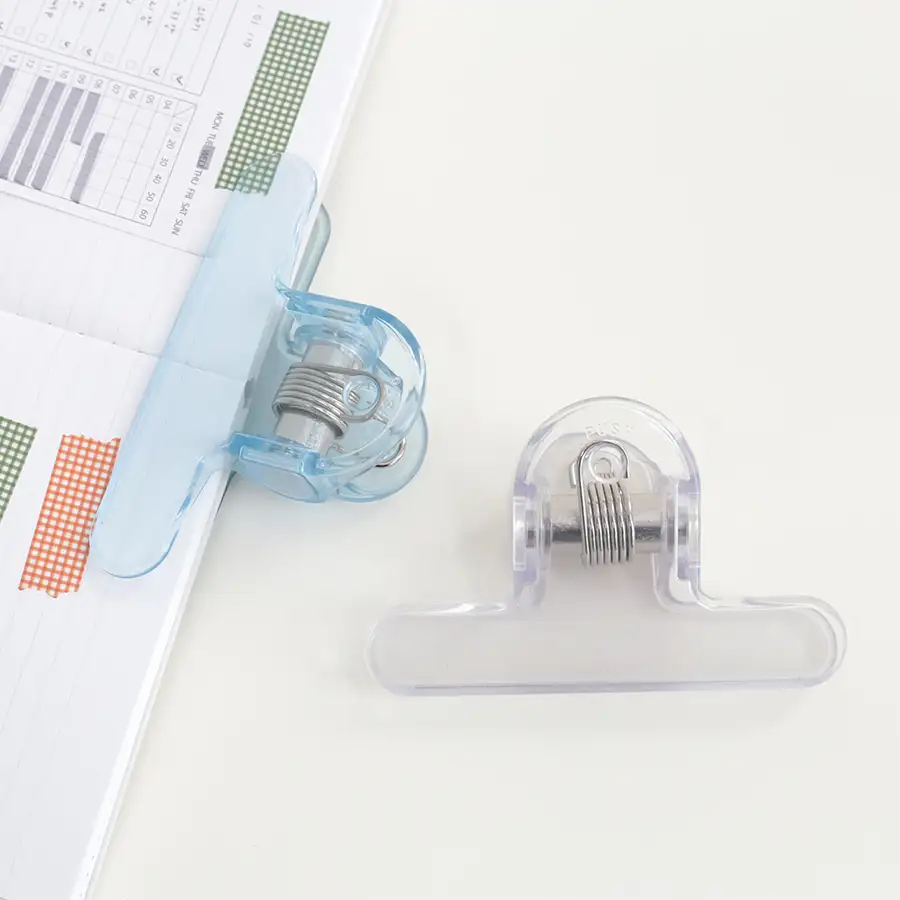 Clear Omo Clip Book Stopper — 3